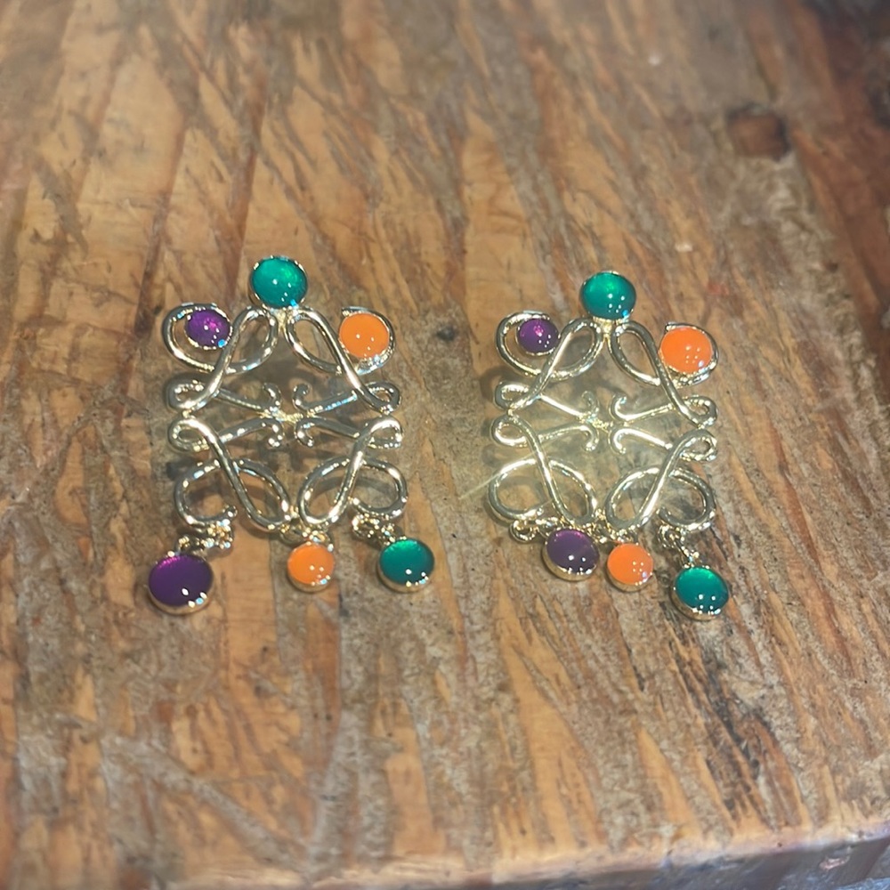 Gold plated earrings with green orange and purple. Never worn. Gold plated.